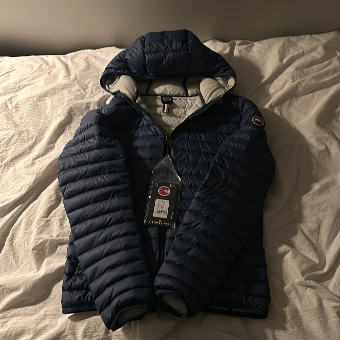 Blå pufferjacka från Colmar