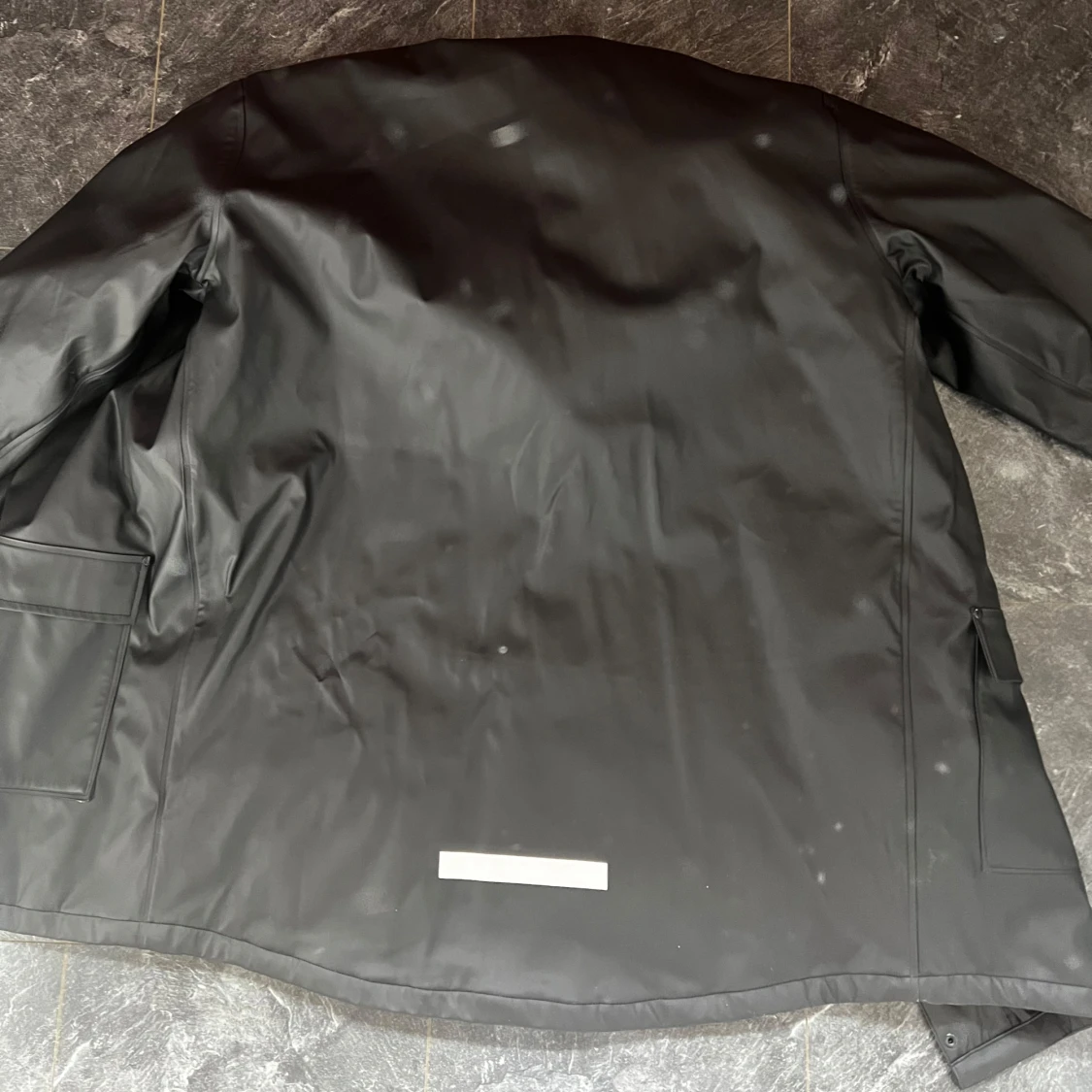 Svart regnjacka från 157 - 1