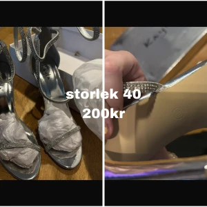 Silver Klackskor  - oanvända, storlek 40.