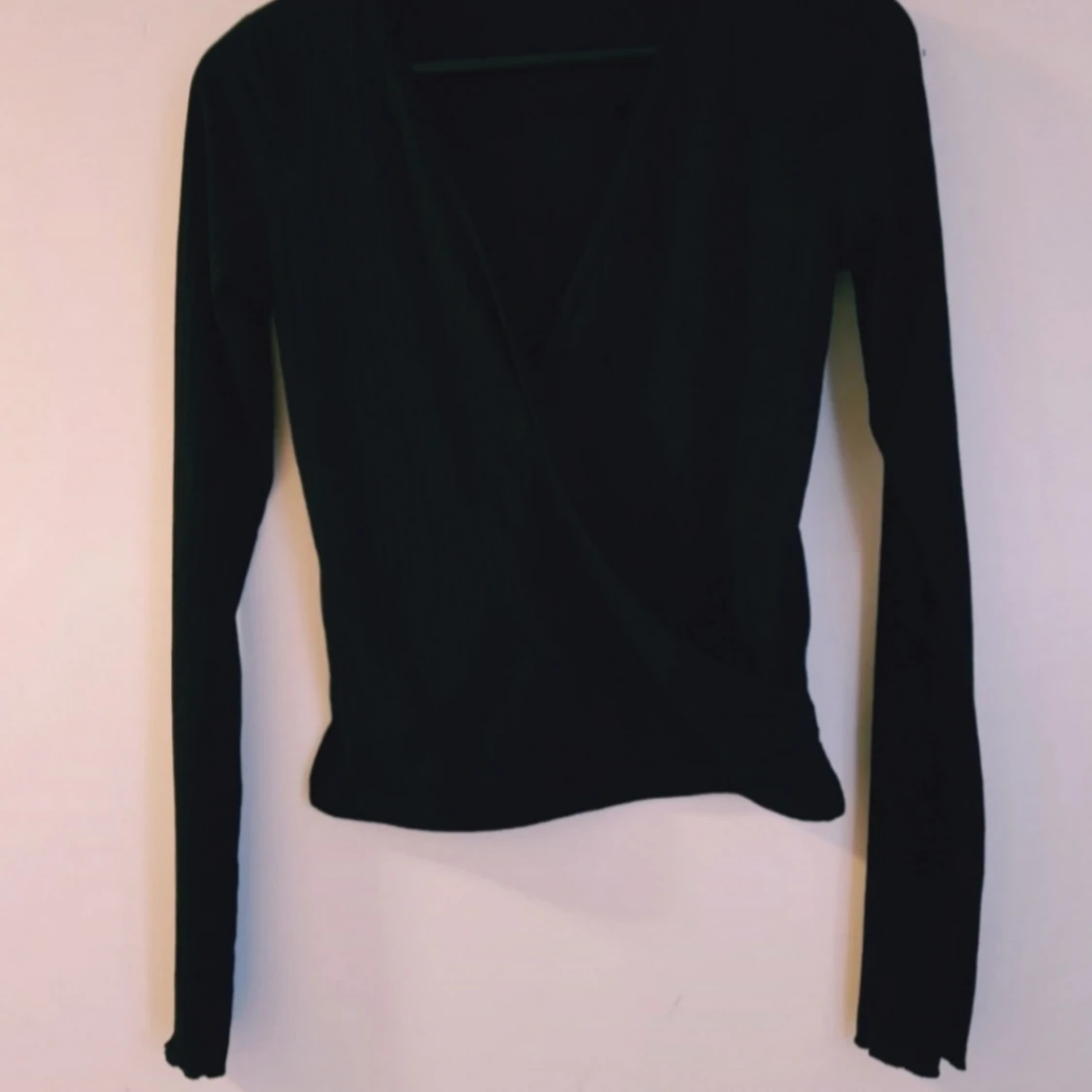 Svart omlottopp från NA-KD XS