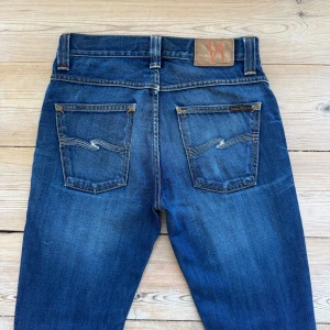 Nudie Jeans - Nudie Jeans (Grim Tim) | Size: W29 L32 | Skick: 8,5/10 vissa små defekter, se bilder | Hör av dig vid frågor och funderingar | Vänliga hälsningar!