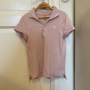 Ralph Lauren barn pike - Ralph Lauren pike i ljusrosa. Barnstorlek 8-10år. 140cm
