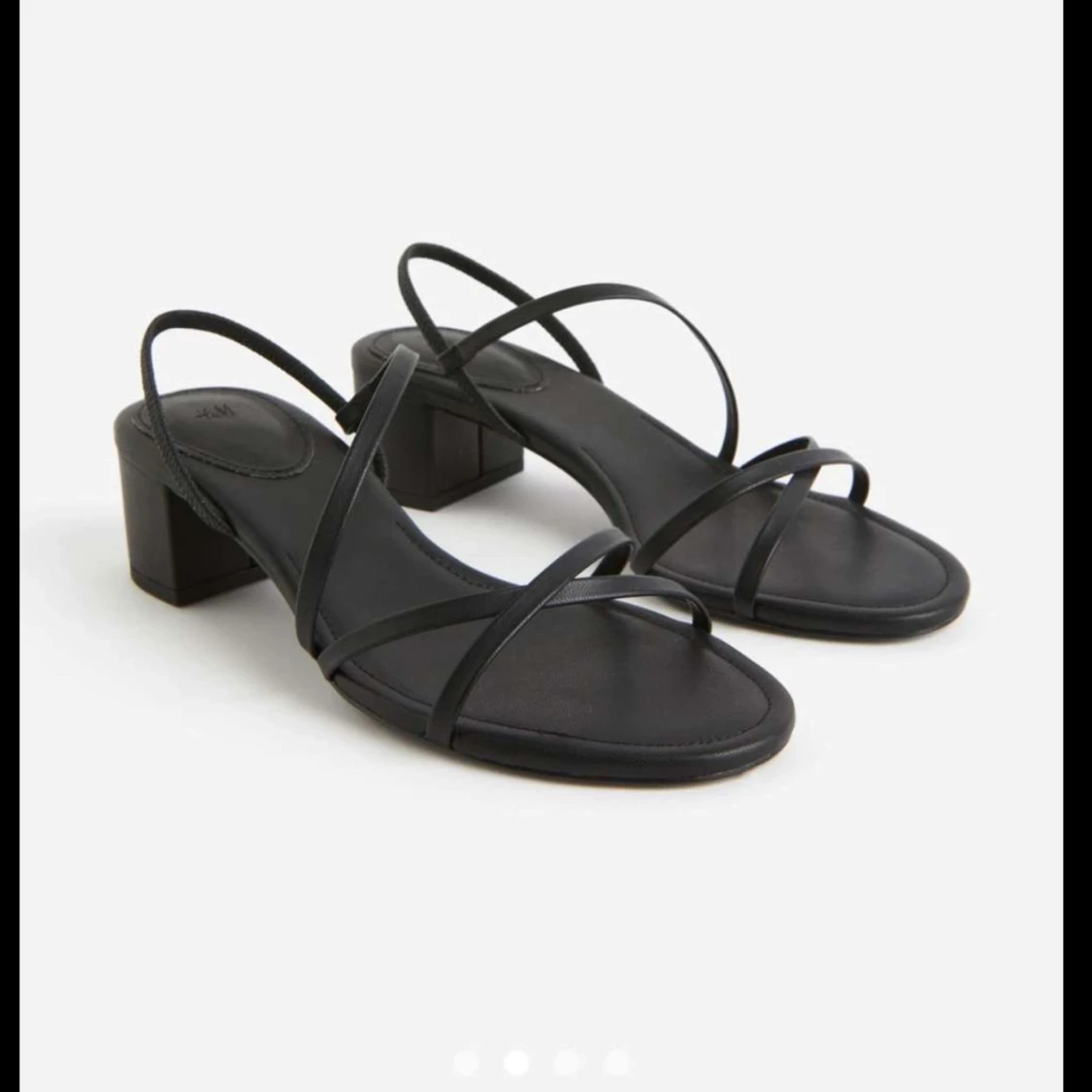 Svarta sandaler med klack