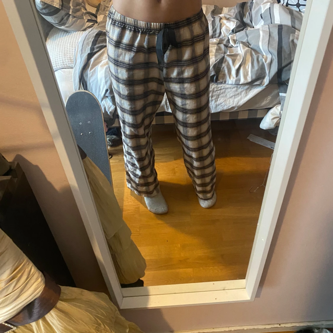 Rutig byxa i beige och svart - 90