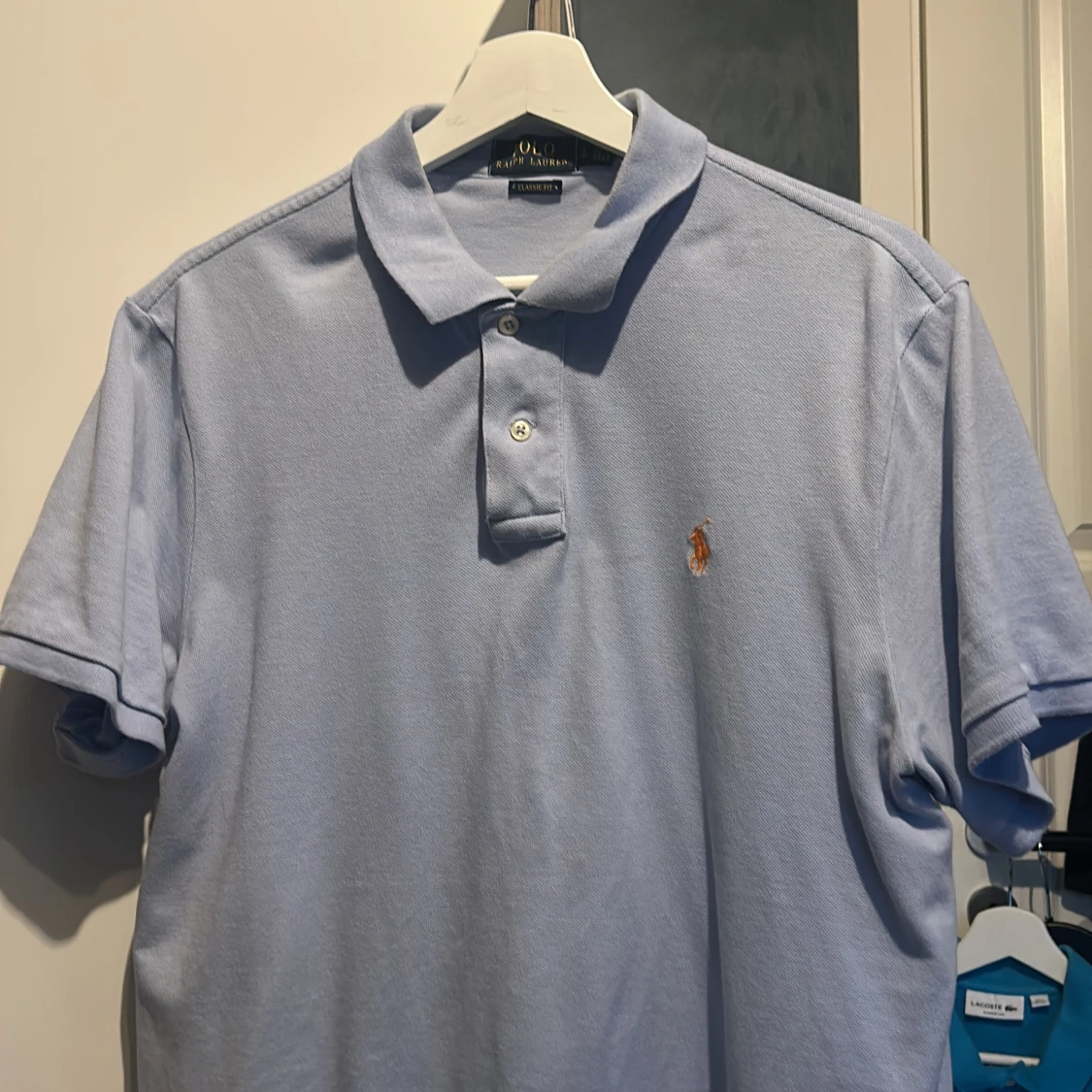 Ljusblå pikétröja från Ralph Lauren