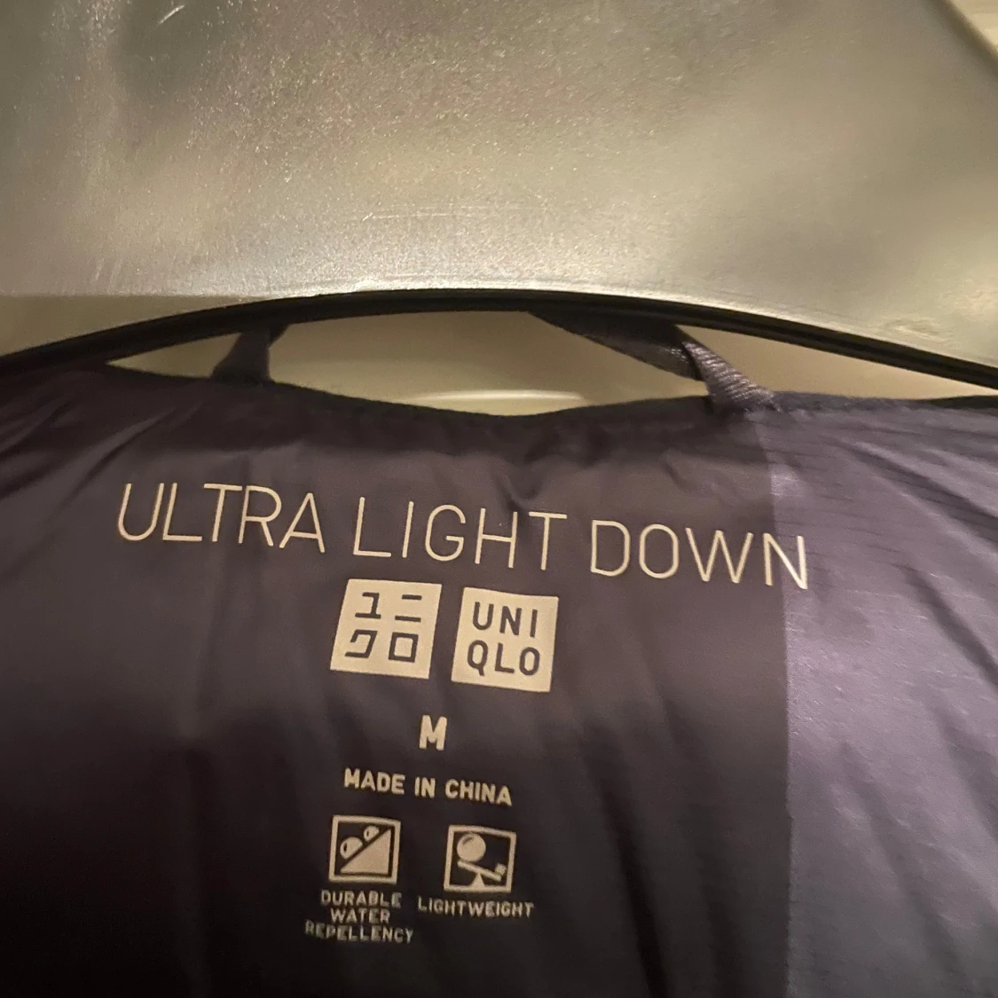 Mörkblå dunjacka från Uniqlo - 1