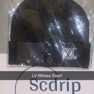 Svart Mössa - Snygg mössa med rutor