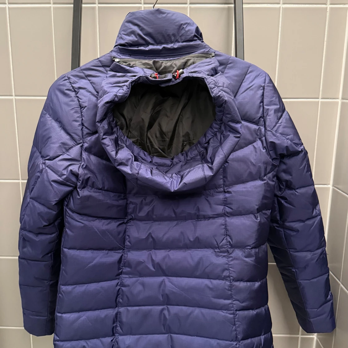 Blå dunjacka från The North Face - 90