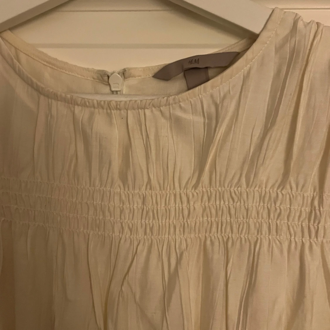 Vit ärmlös blus från H&M - 1