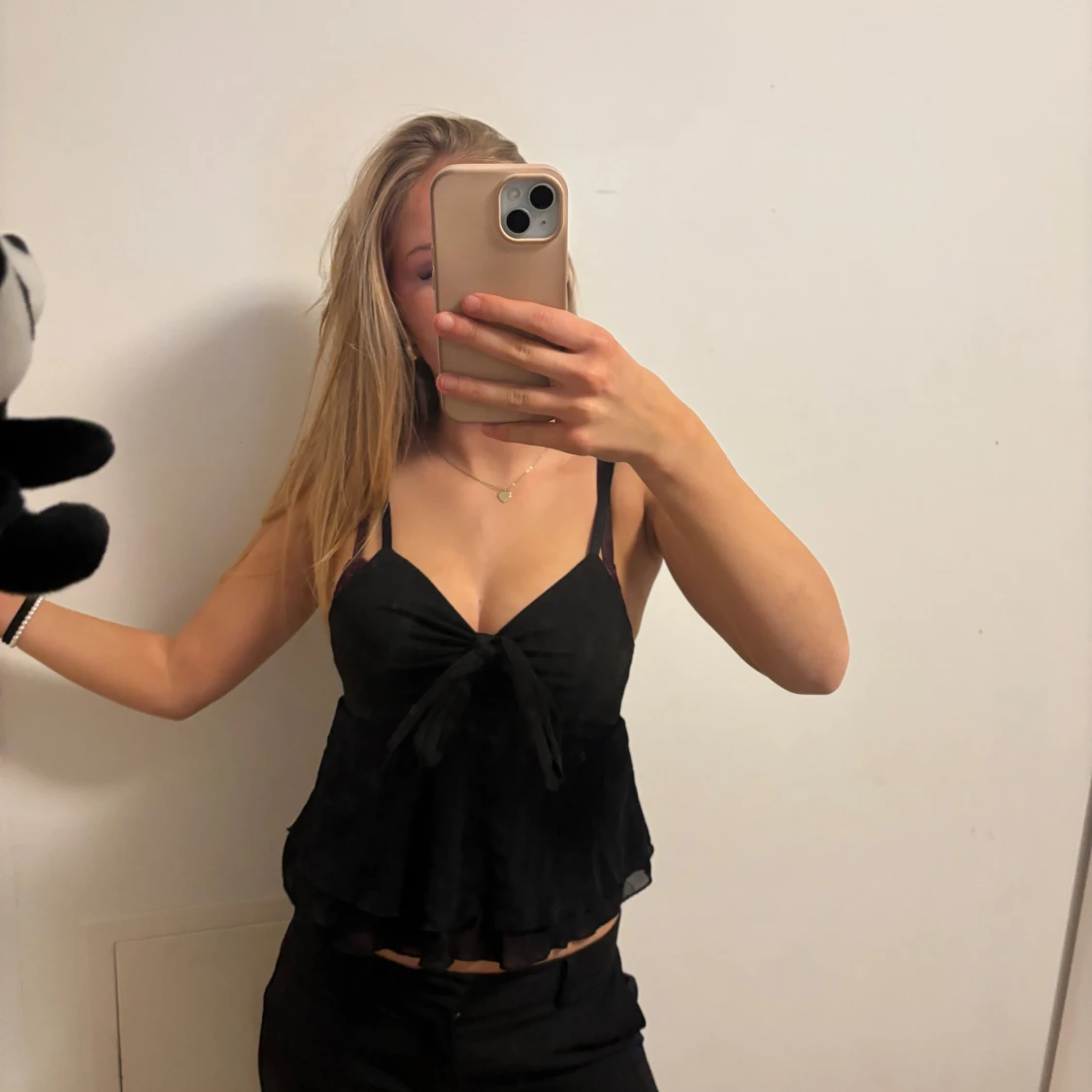 Svart ärmlös topp med knyt