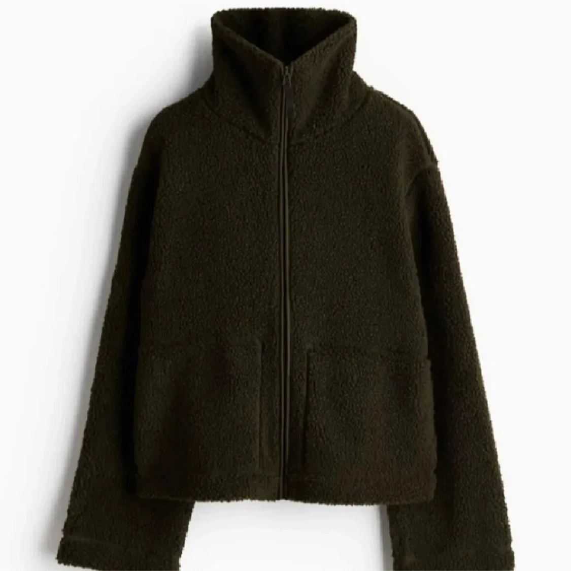 Mörkgrön teddyjacka