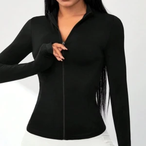 Tight träningströja  - Tight träningströja, knappt använd. 