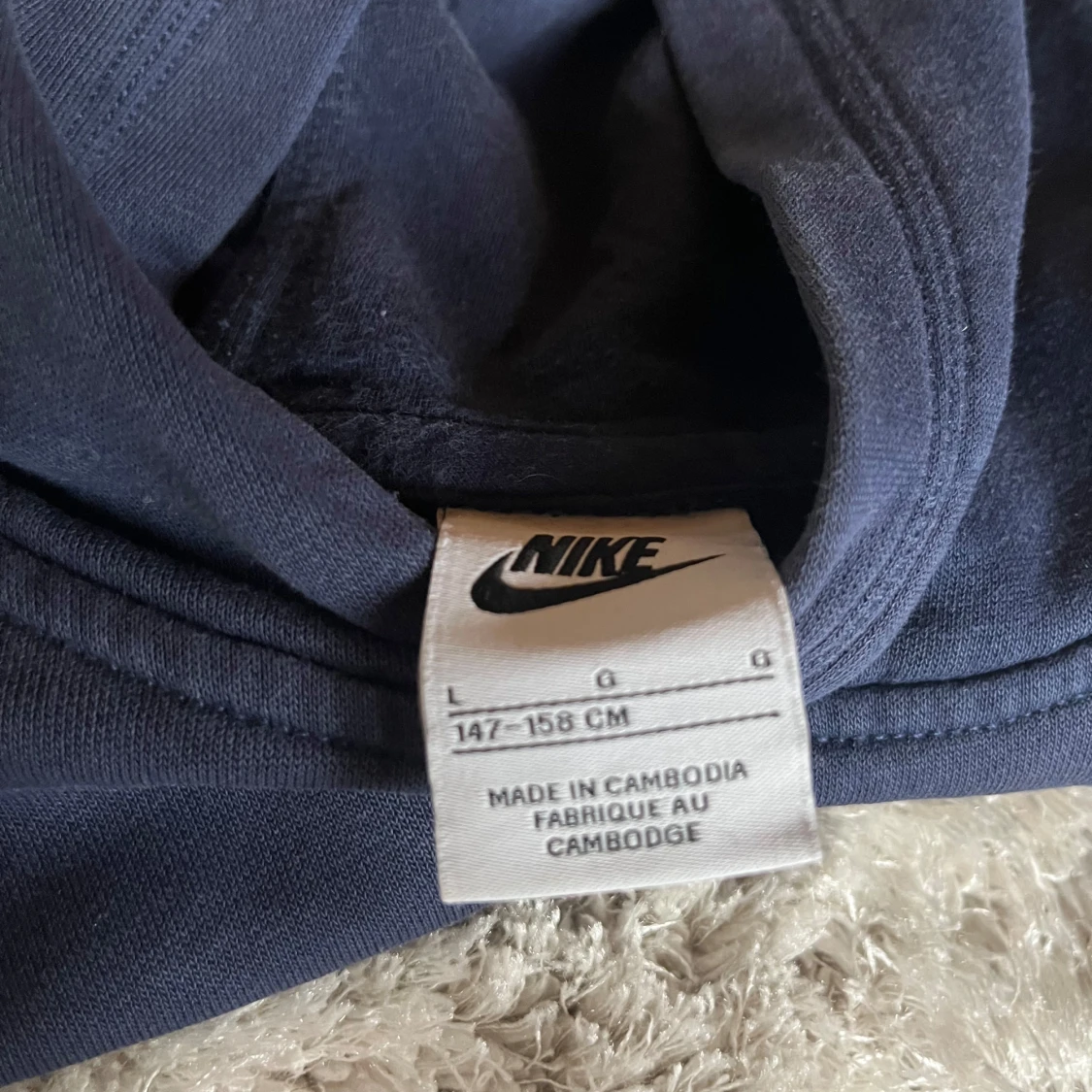 Mörkblå hoodie från Nike - 91