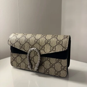 Axelremsväska  - Väska