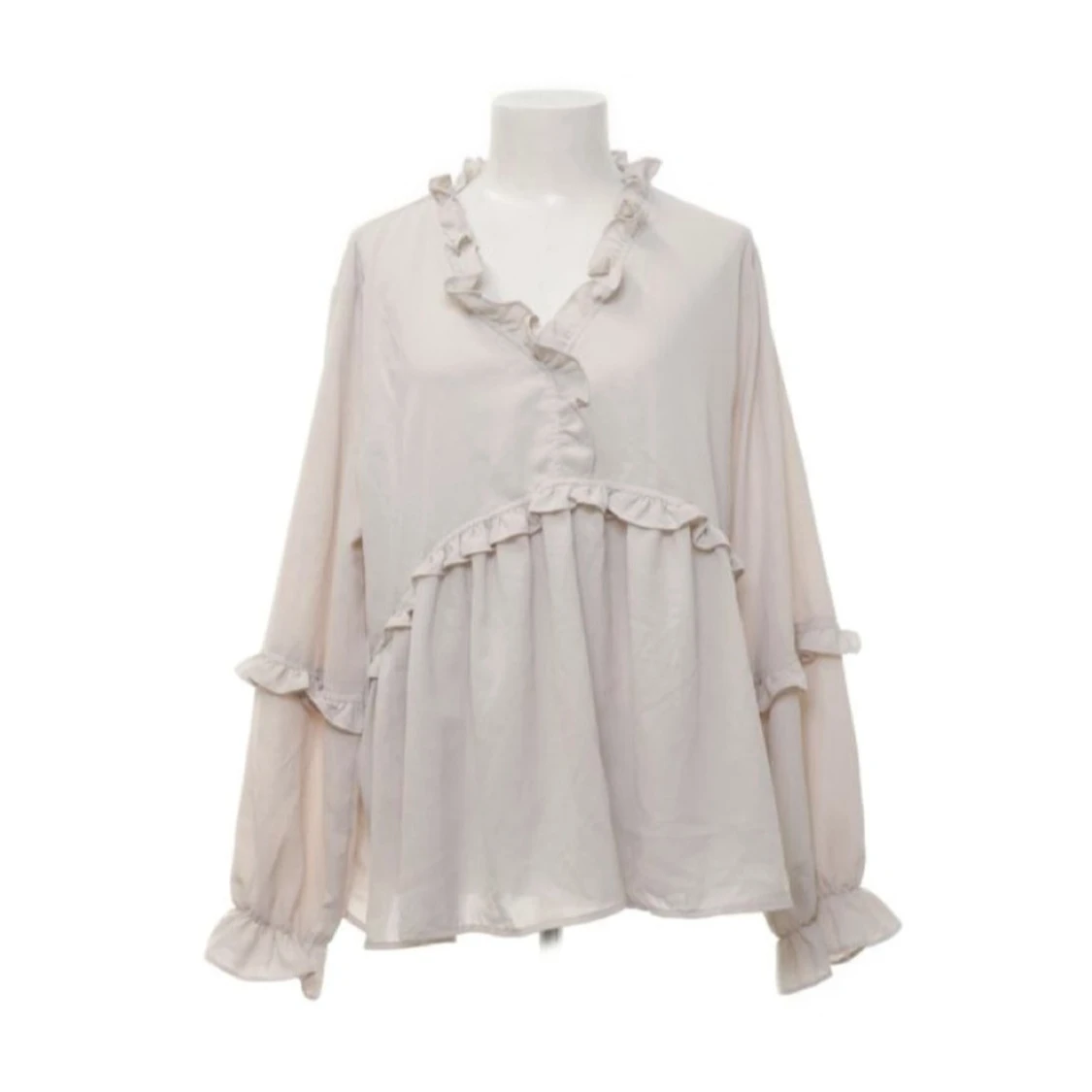 Beige blus med volangdetaljer - 90