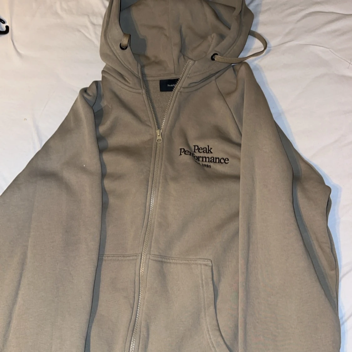 Beige hoodie från Peak Performance - 91