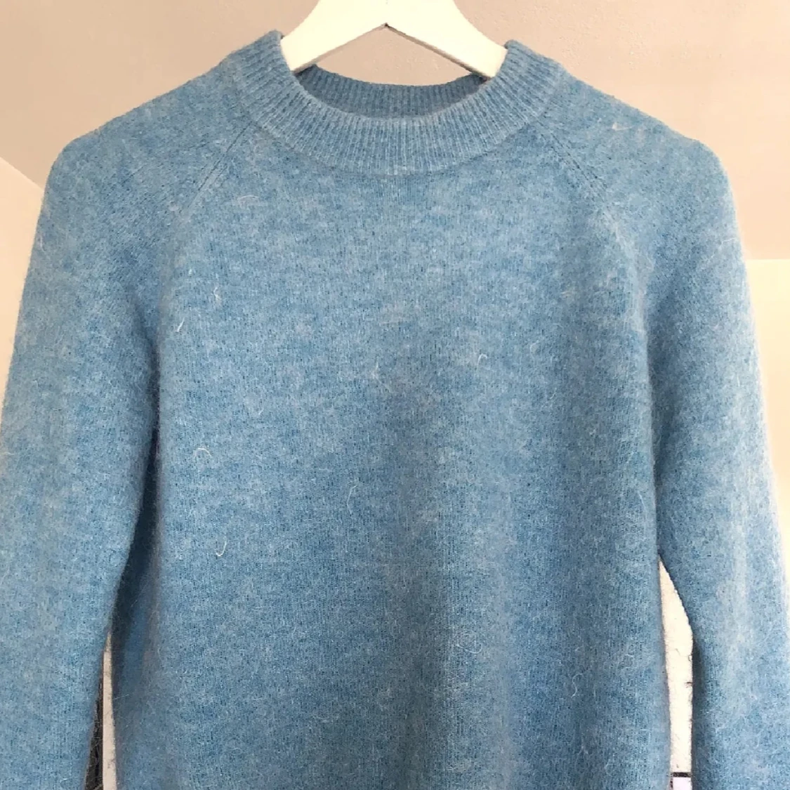 Ljusblå stickad tröja