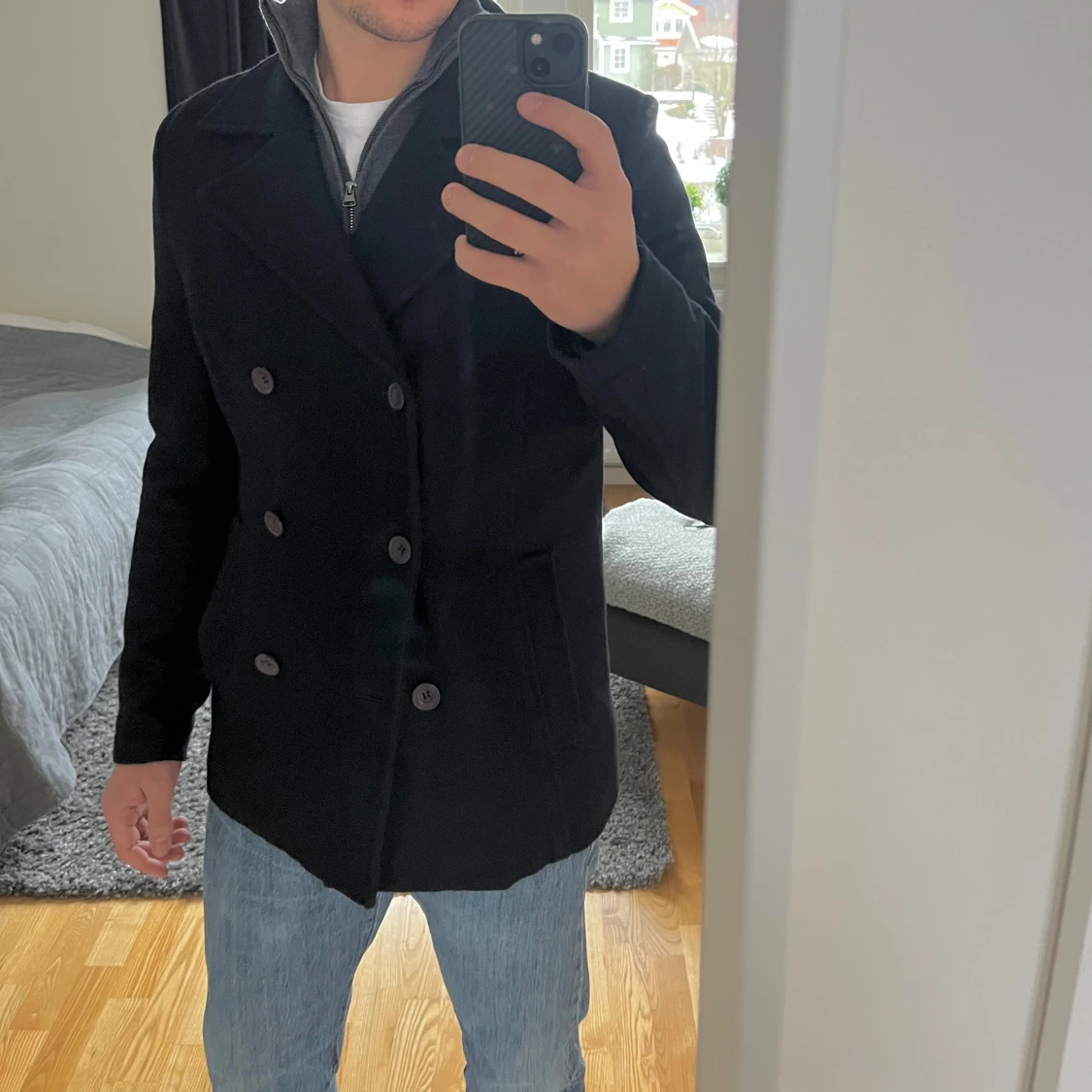 Mörkblå skepparkavaj från Henri Lloyd