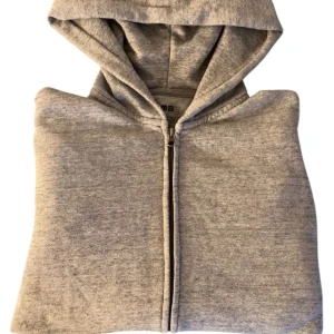 Grå hoodie från Uniqlo - Säljer en stilren grå hoodie från Uniqlo i storlek XS. Den har en dragkedja framtill och en praktisk huva. Perfekt för en avslappnad look.
