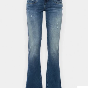 Blå bootcut jeans - Snygga blå bootcut jeans i bra skick från ltb.