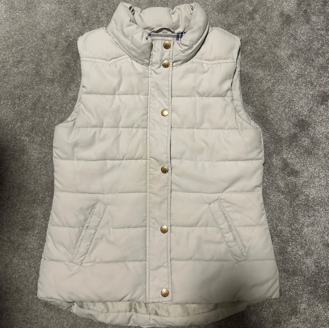 Ljus beige dunväst