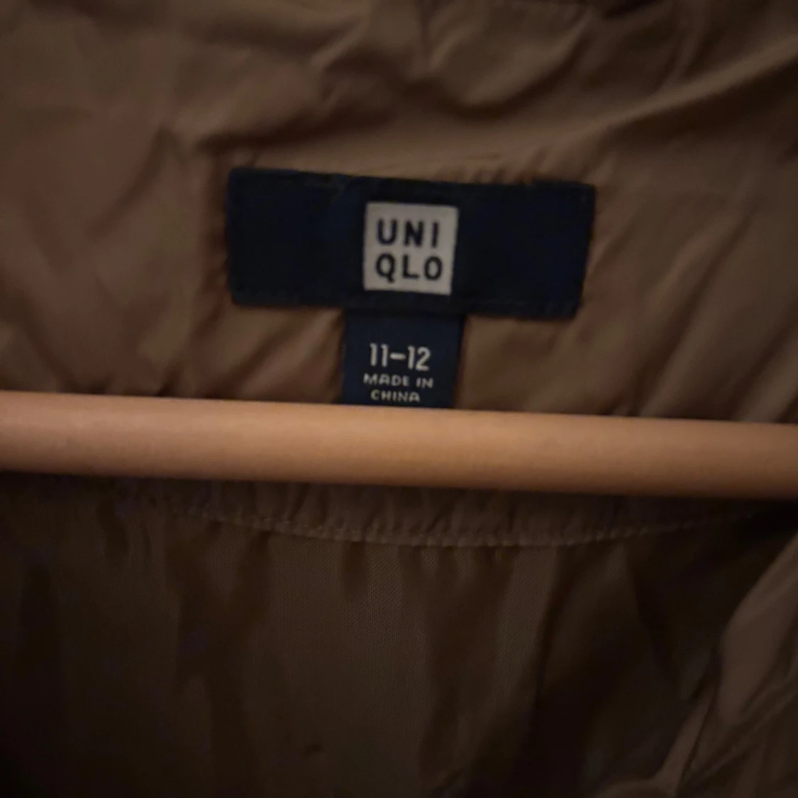 Brun dunjacka från Uniqlo - 92