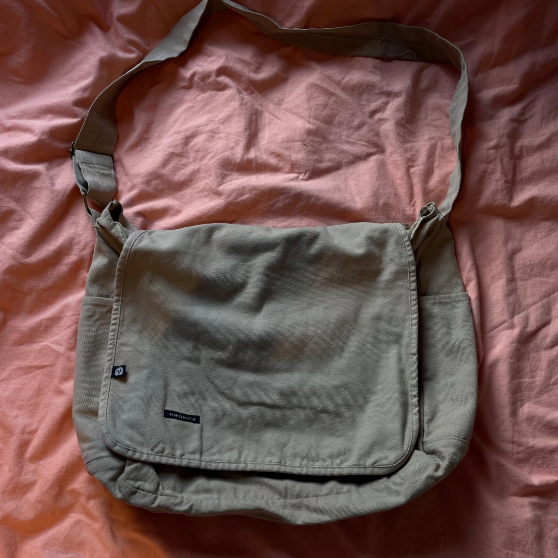 Beige messenger bag