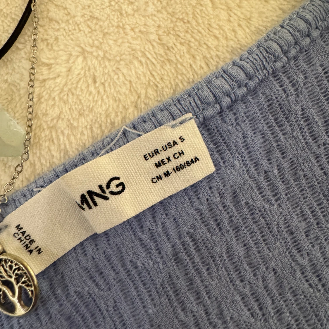 Ljusblå kofta från Mango - 91