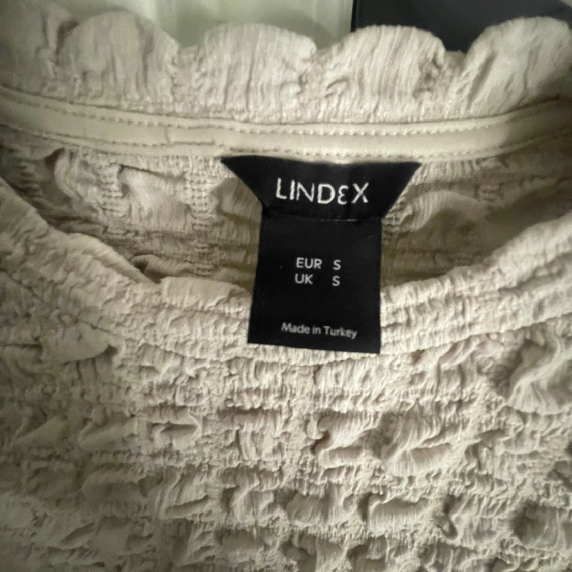 Beige topp från Lindex - 92