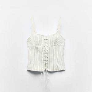 Vit randig korsett med snörning - Snygg vit korsett topp från Zara, helt ny med prislapp kvar, endast testad