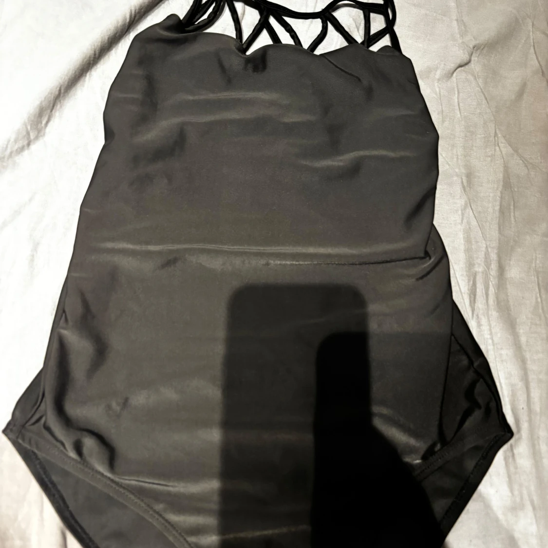 Svart baddräkt med snörning