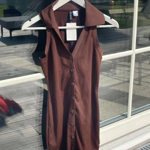 Kort klänning med prislapp - Helt ny med prislapp 