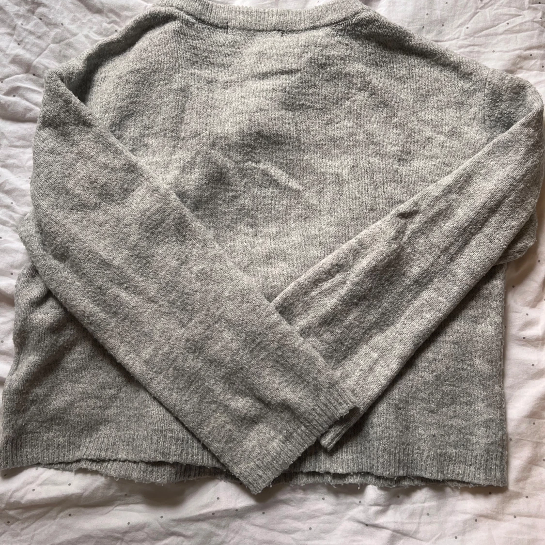 Grå stickad tröja från 157 - 2