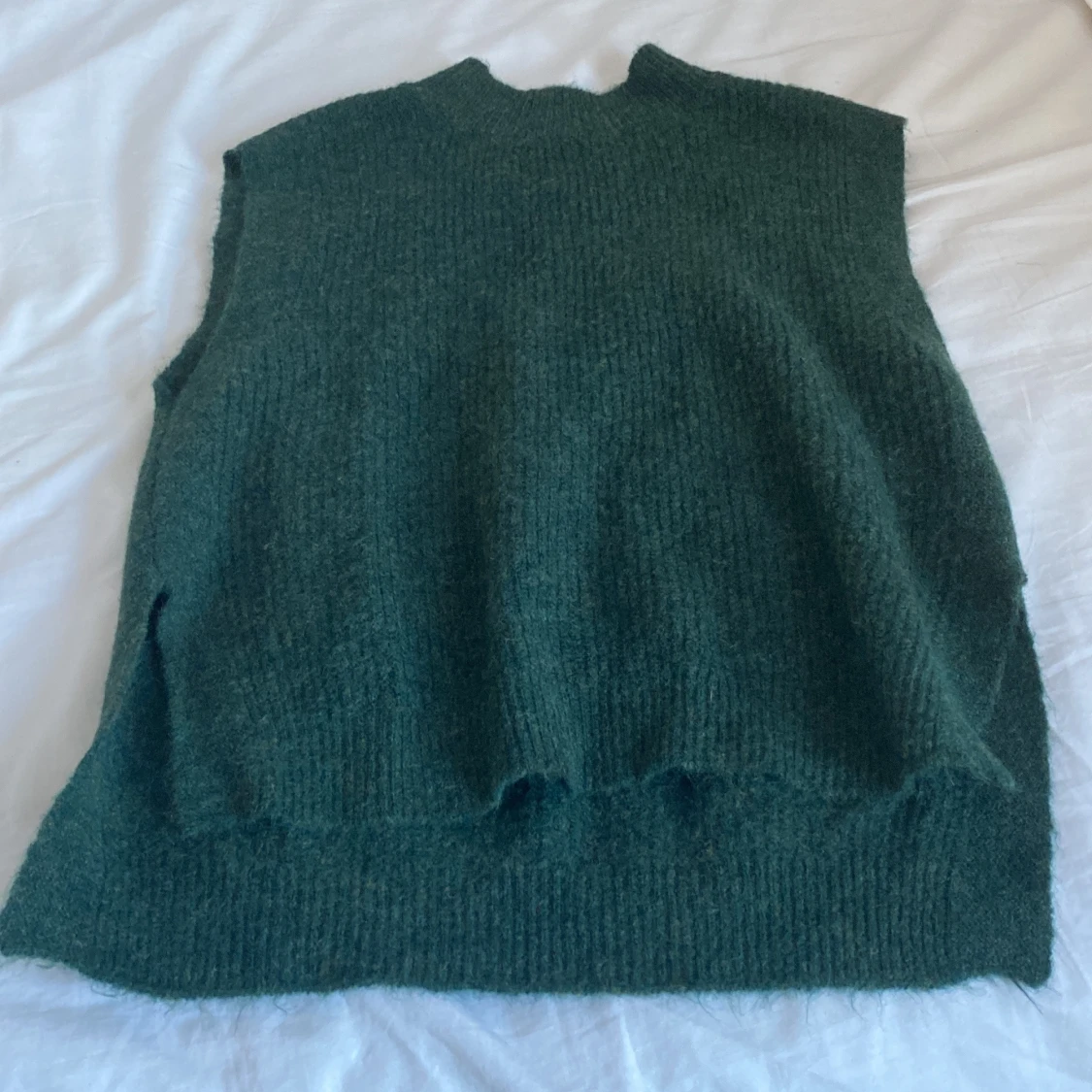 Grön stickad väst