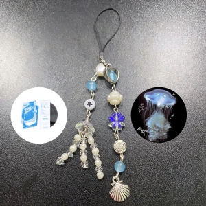 W2E nyckelring - Wave to earth inspirerande nyckelring som är 100% handgjord av mig! 