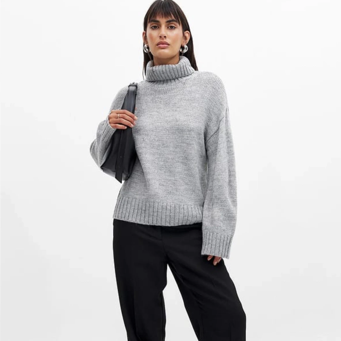 Grå stickad polotröja