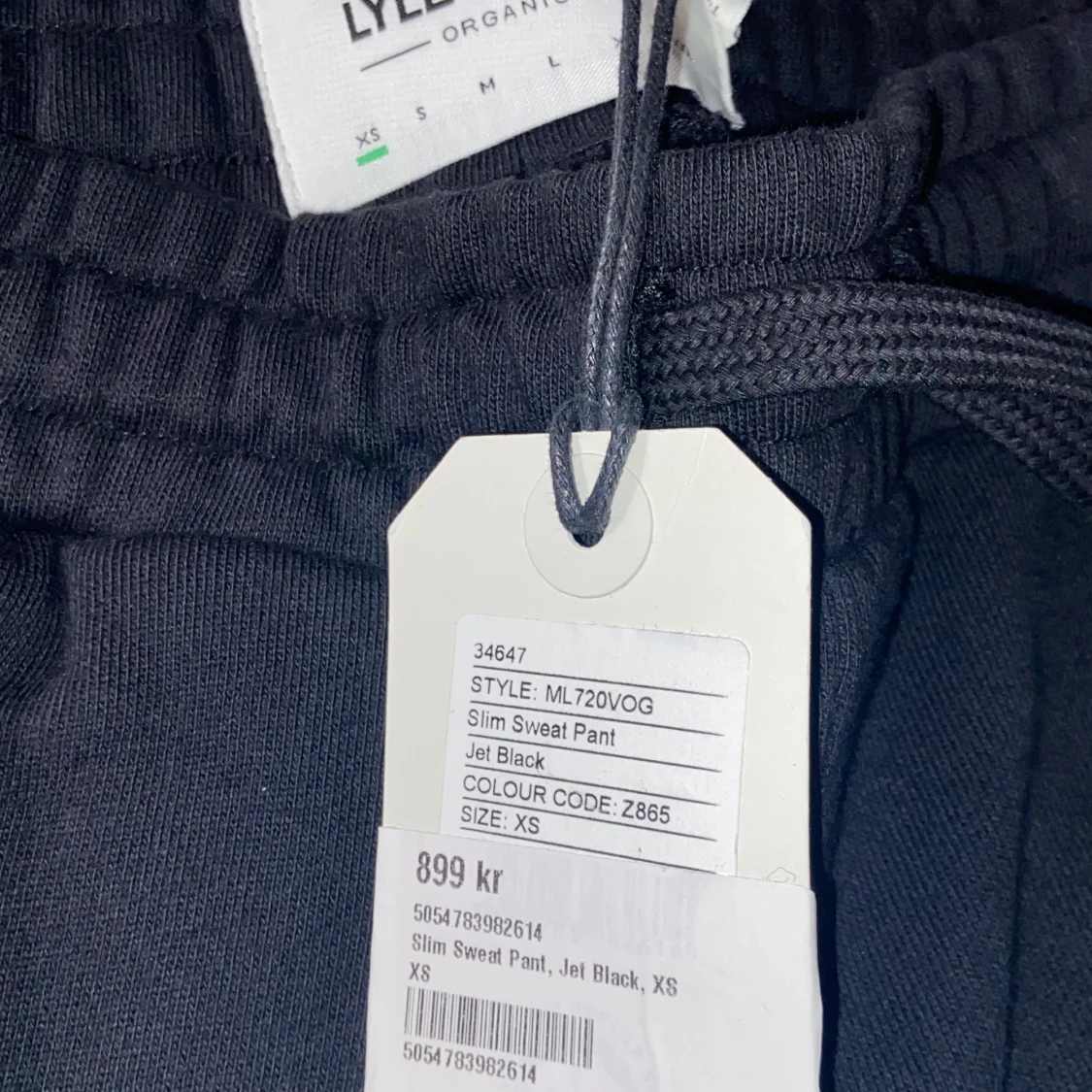 Mörkblå mjukisbyxor med gul logga - 1