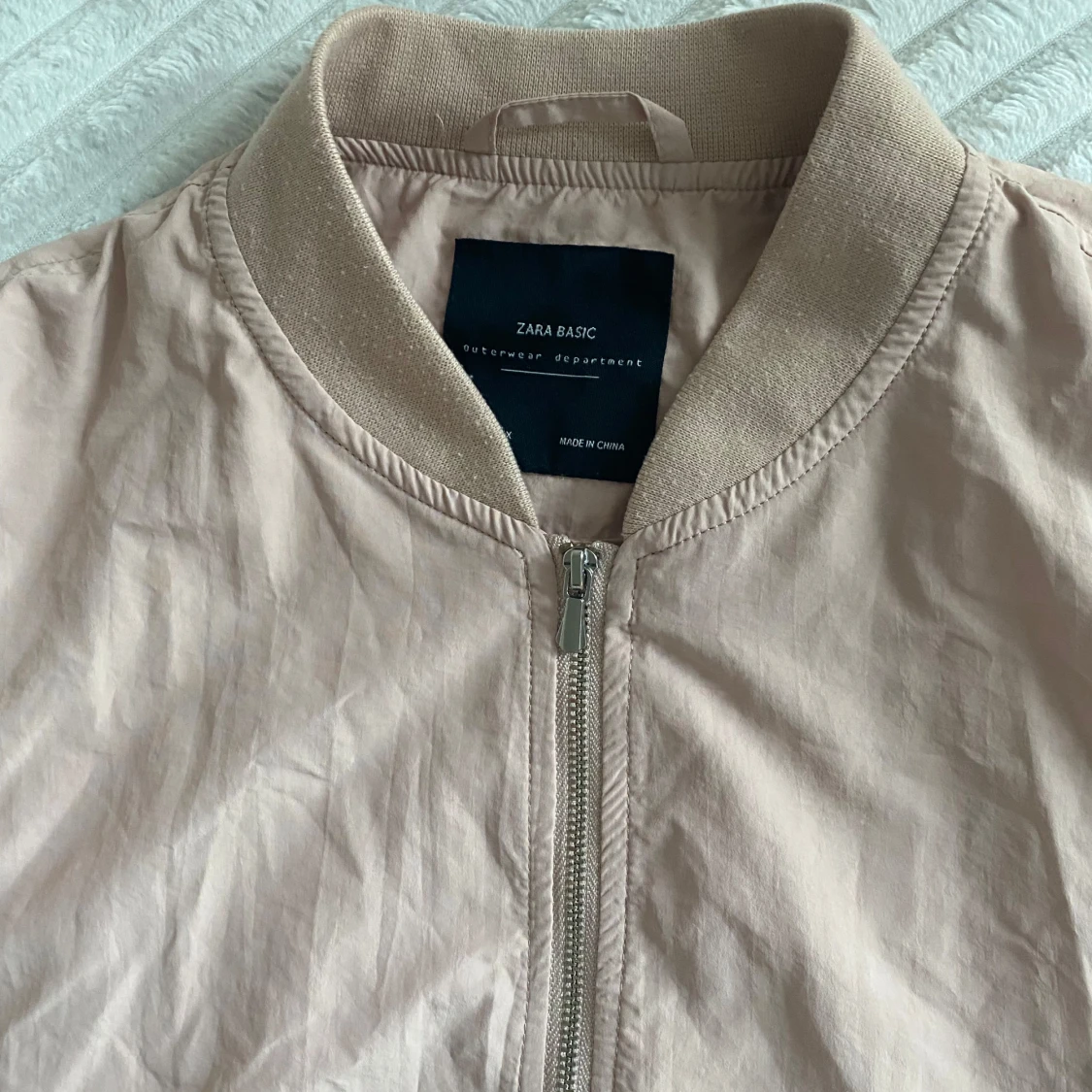 Ljusrosa jacka  - 91