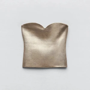 Guldig korset-topp - Snygg guldig korsett-top från Zara! Använd ett par fåtal gånger, inga defekter! ❤️‍🔥