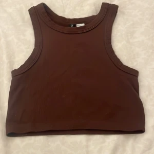 Brunt linne  - Brunt linne som har stretchigt tyg.