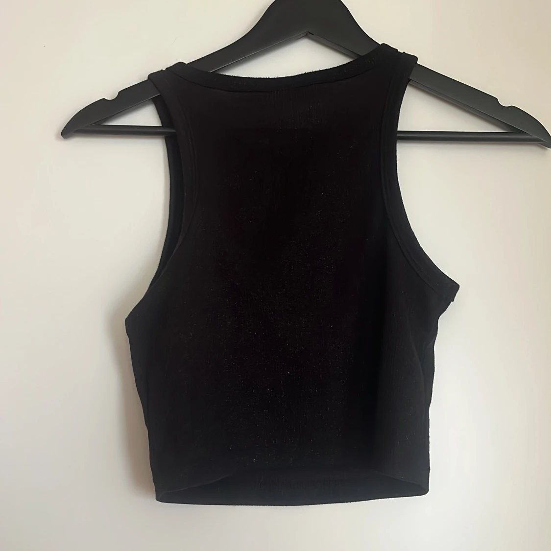 Svart glittrig croppad linnetopp - 90