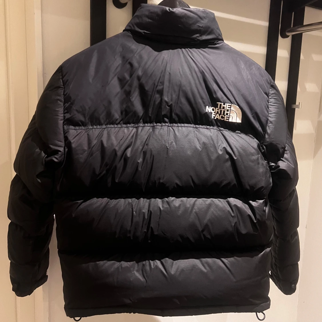 Svart dunjacka från The North Face - 90