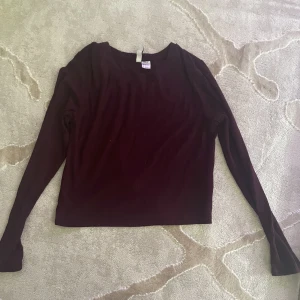 maroon full sleeve  - tight fitting full sleeve good condition 