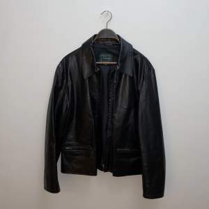 A trendy black leather jacket. 