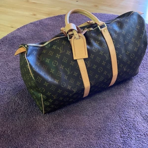 Äkta Louis Vuitton  monogram travel bag. - Aldrig använd 50x30 brun monogram vintage Finns fler bilder 