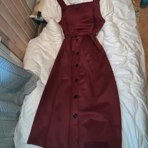 Vinröd klänning - Använde en gång. Köpte den från Egypten. One-size. 