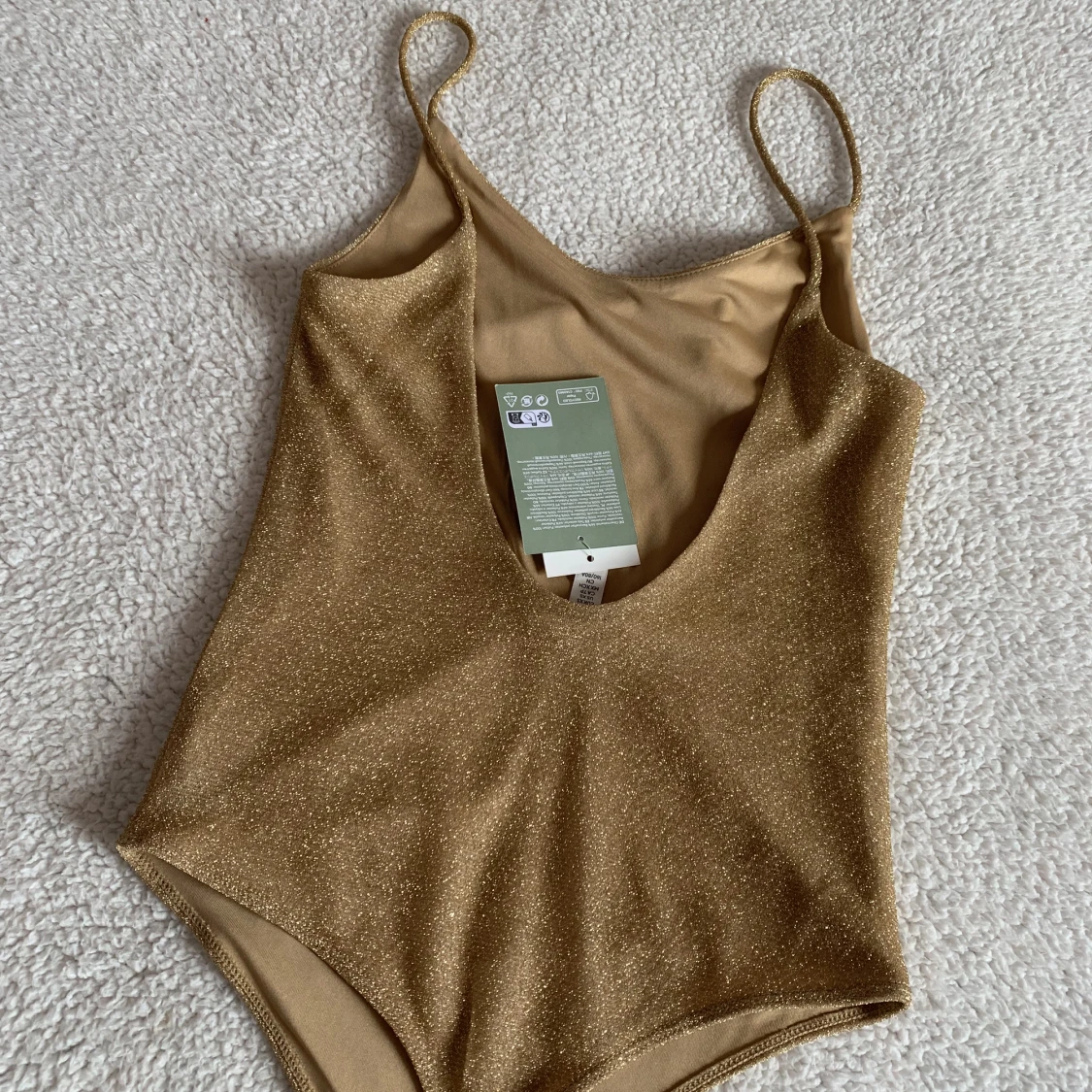 H&M GULDIG GLITTER BODY  - 90