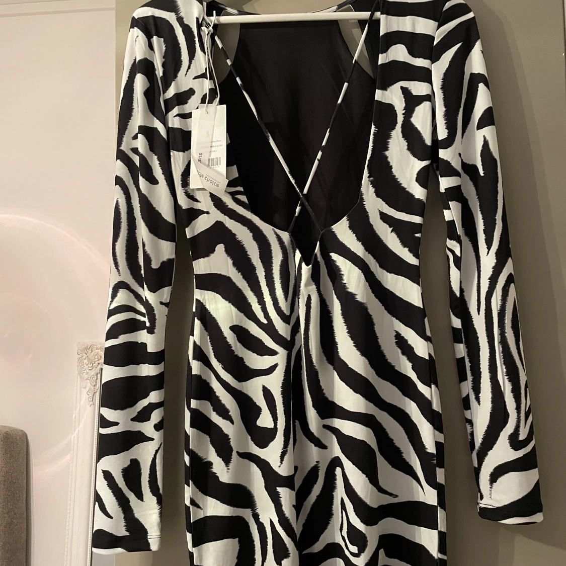 Miniklänning med utskurna partier - 90