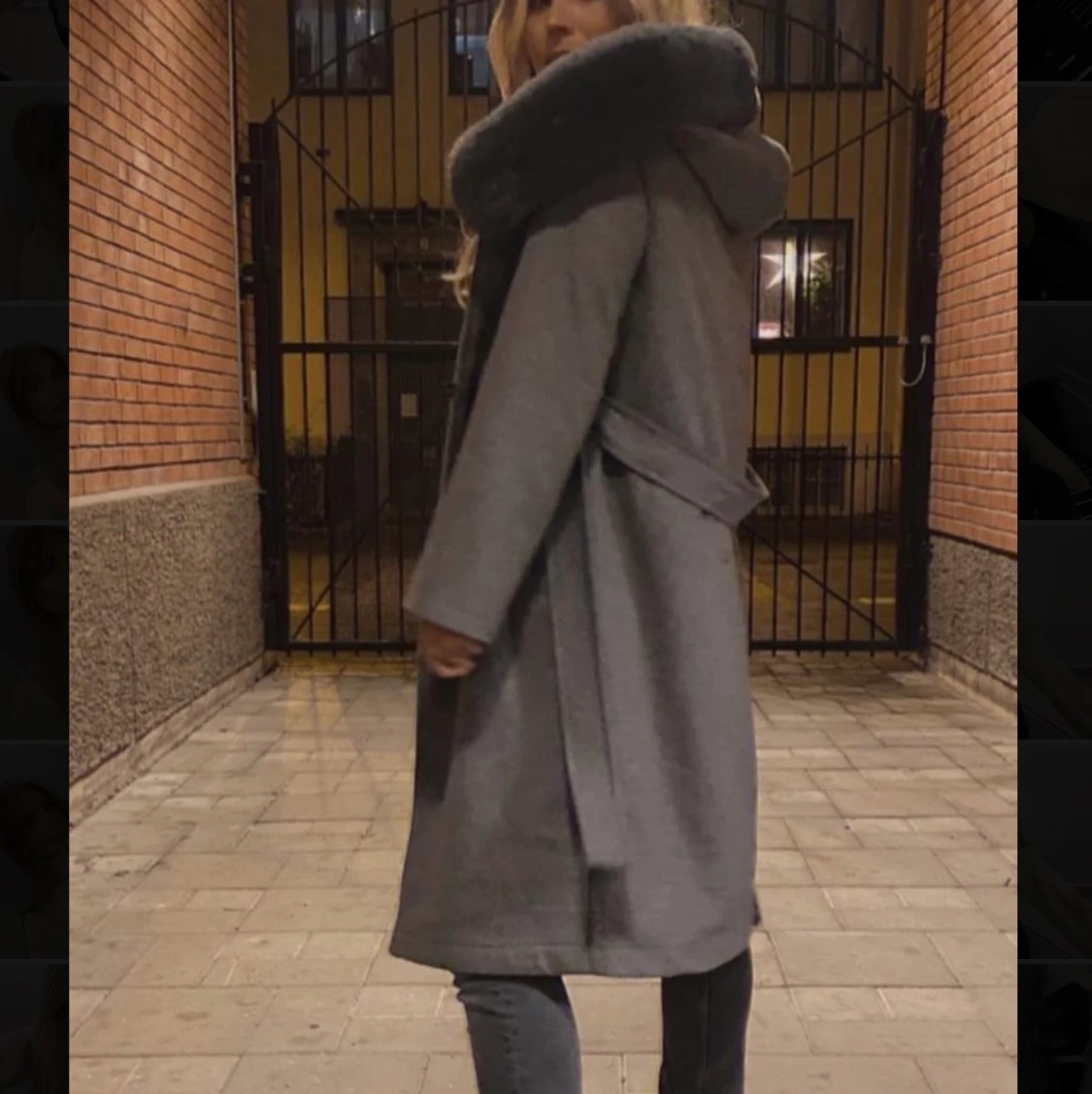 Grå kappa med fuskpäls
