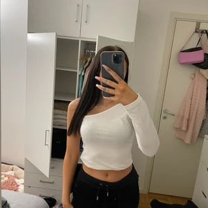 Tröja med en arm - Ribbad Tröja med en arm, i storlek s, inga tecken på användning